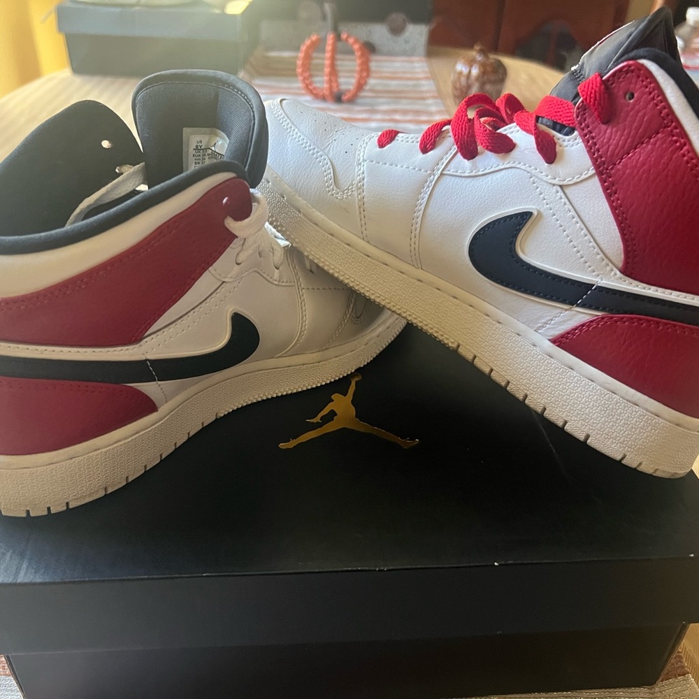Nike Air Jordan Mid Red, White, and Black Sneakers